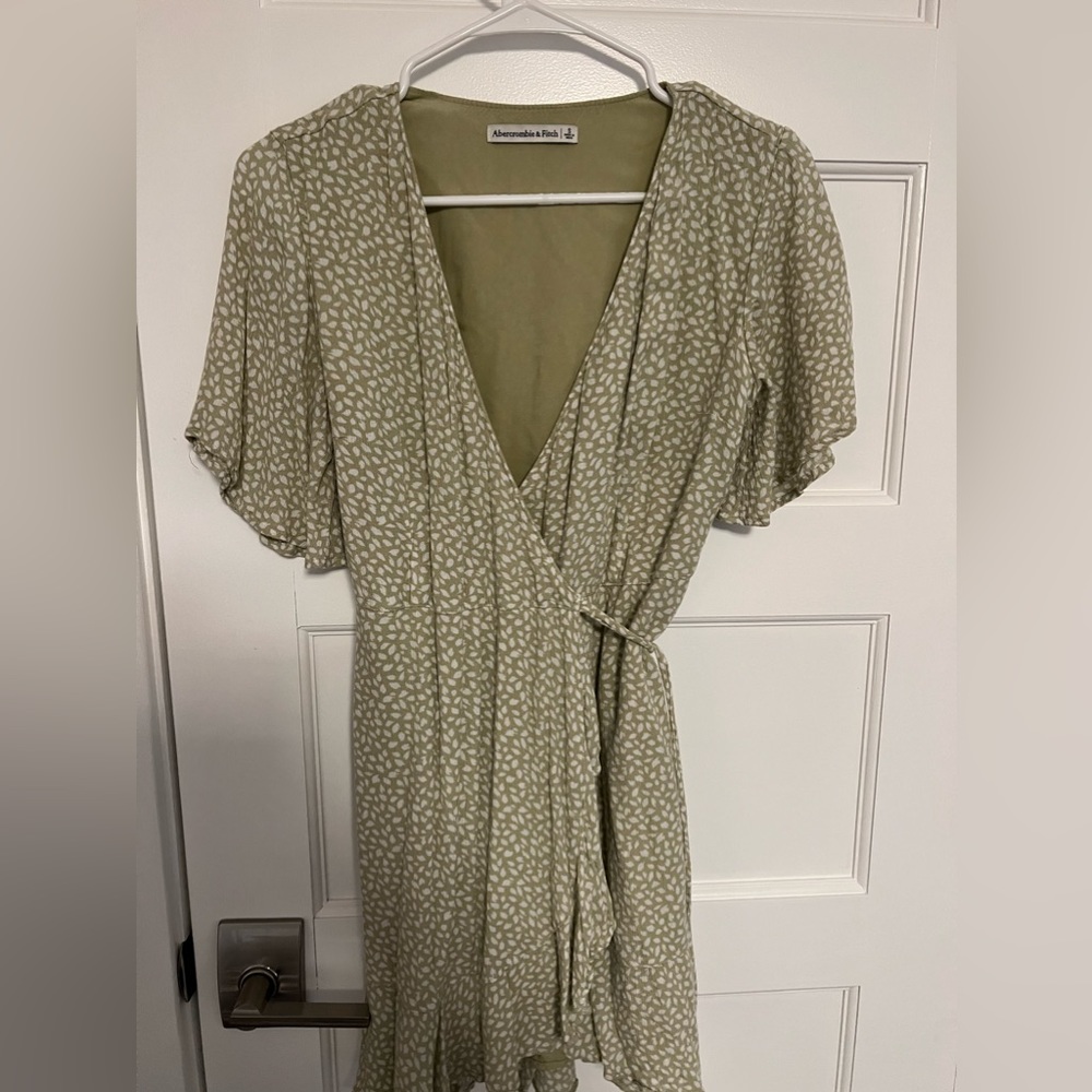 Wrap around green and white dress